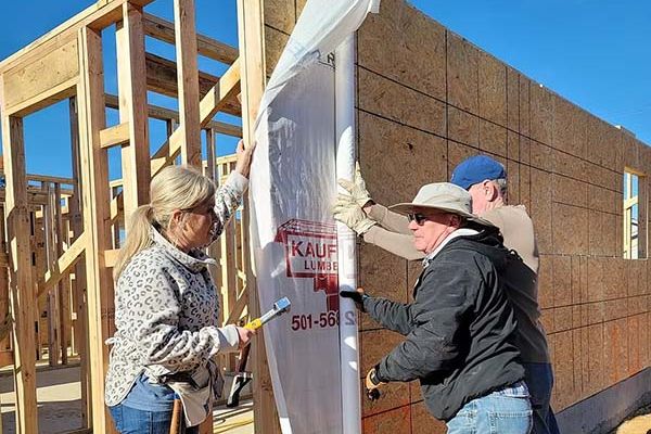 Habitat volunteers working on a home construction project